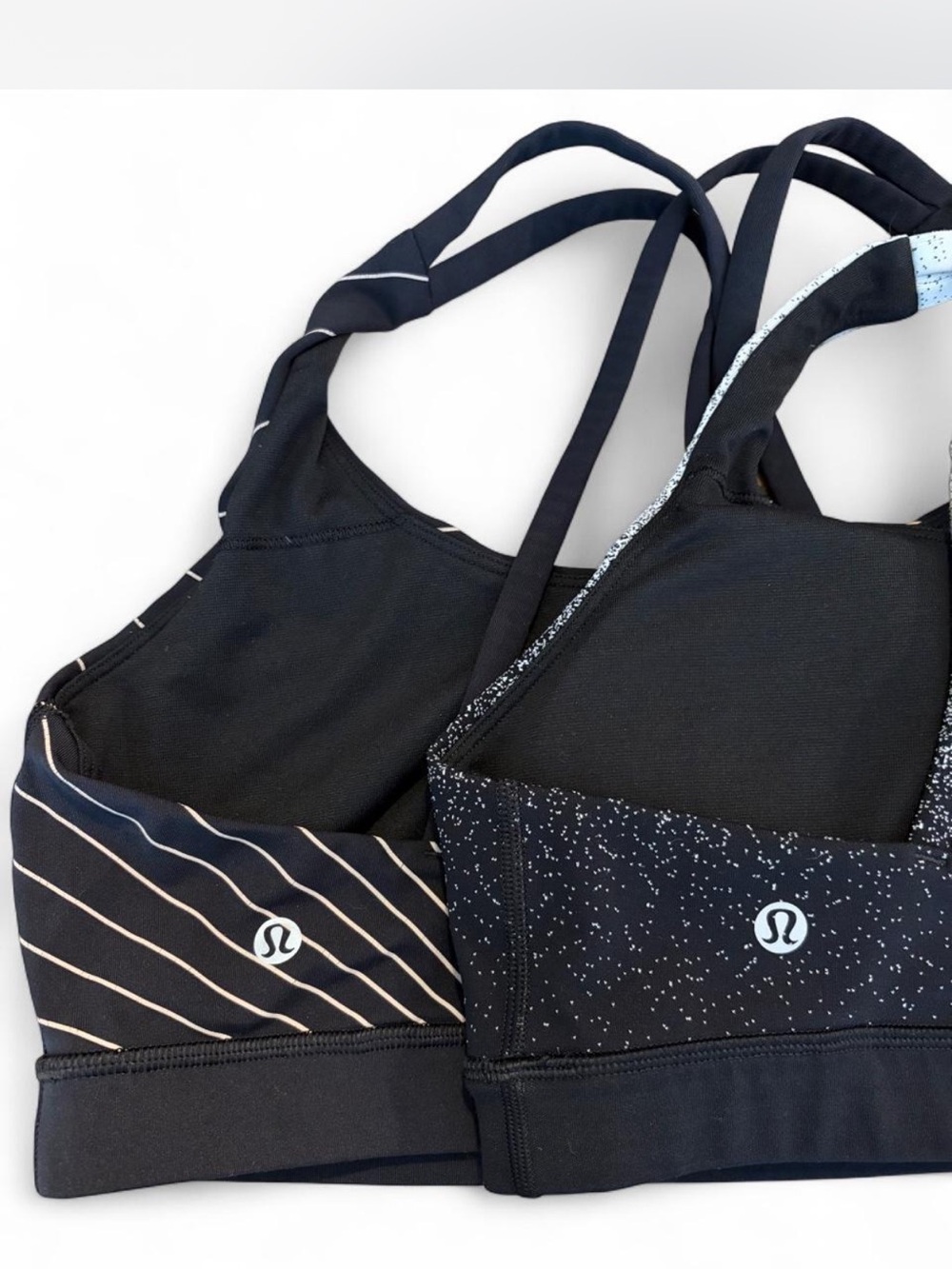 Two Lululemon Sz. 10 sports bras w/ beige stripes on one + tiny spots on other